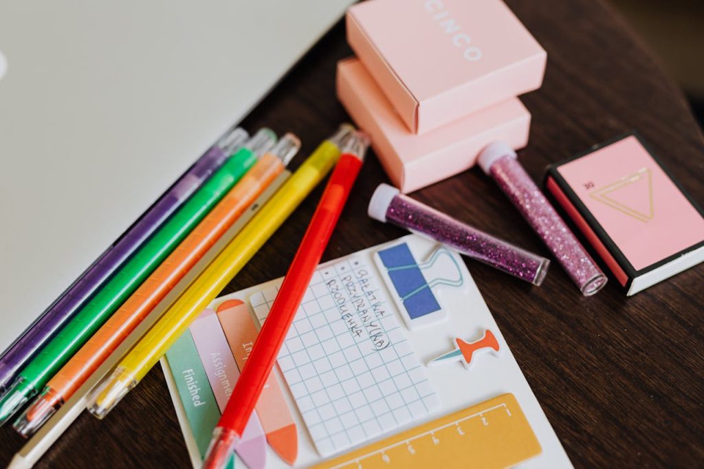 Vibrant pens and stationery on a desk, perfect for office or school use.